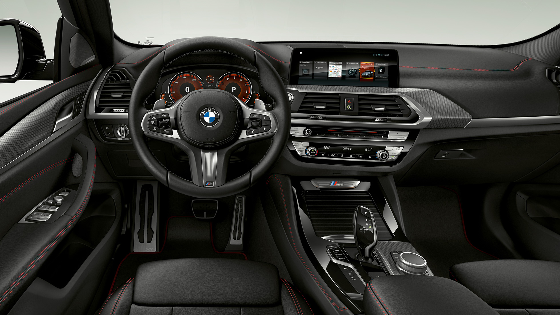 BMW X4 M40i cockpit. BMW X4 M40i interior, cockpit with M leather steering wheel and M Sport seats.